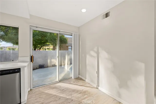 a view of a bathroom with a tub and shower