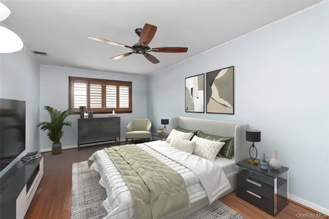 a bedroom with a bed a large window and flat screen tv