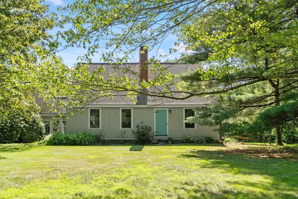 4 Prospect Hill Road Harvard, MA 01451 - Photo 1 of 37 a front view of a house with a garden