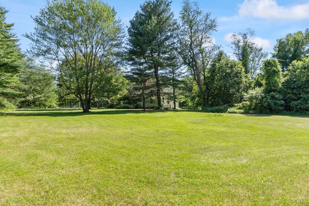4 Prospect Hill Road Harvard, MA 01451 - Photo 2 of 37 a view of a swimming pool with an outdoor space and seating area