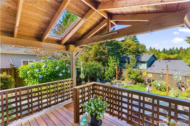 a balcony with wooden floor