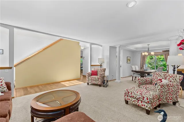 a room with furniture and a large window