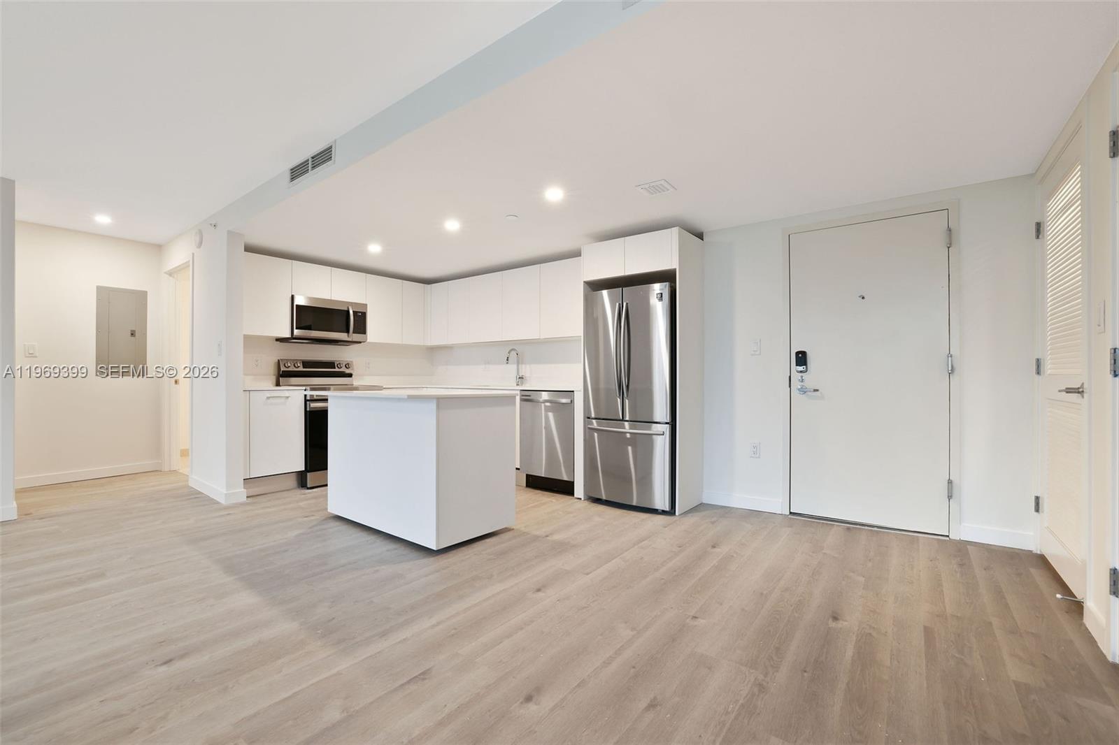 1504 Bay Road, Unit N1208 Miami Beach, FL 33139 - Photo 2 of 84 a view of kitchen with stainless steel appliances refrigerator oven