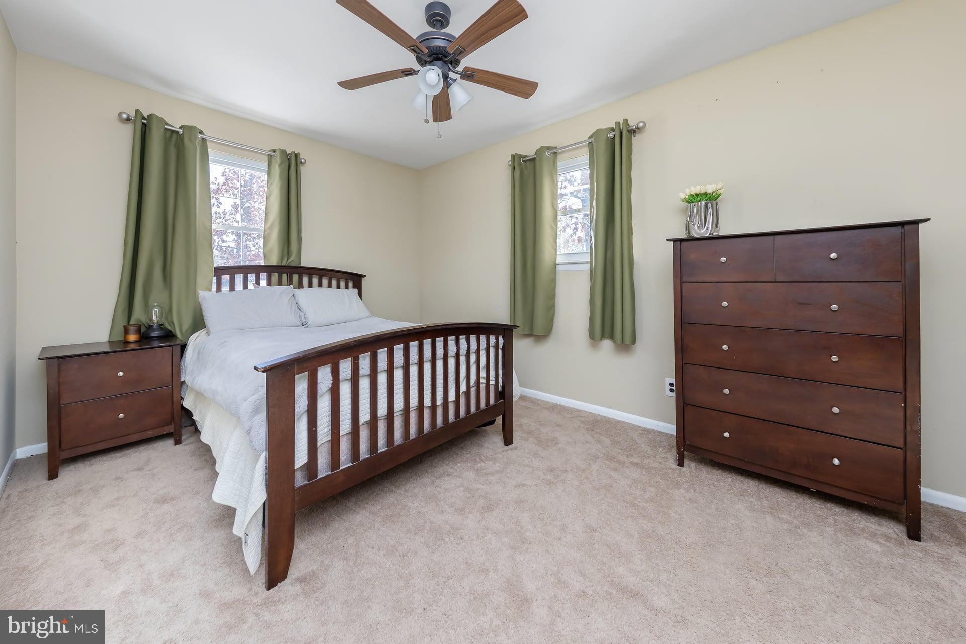 2311 Gennessee Avenue Atco, NJ 08004 - Photo 17 of 22 a bedroom with a bed and a dresser