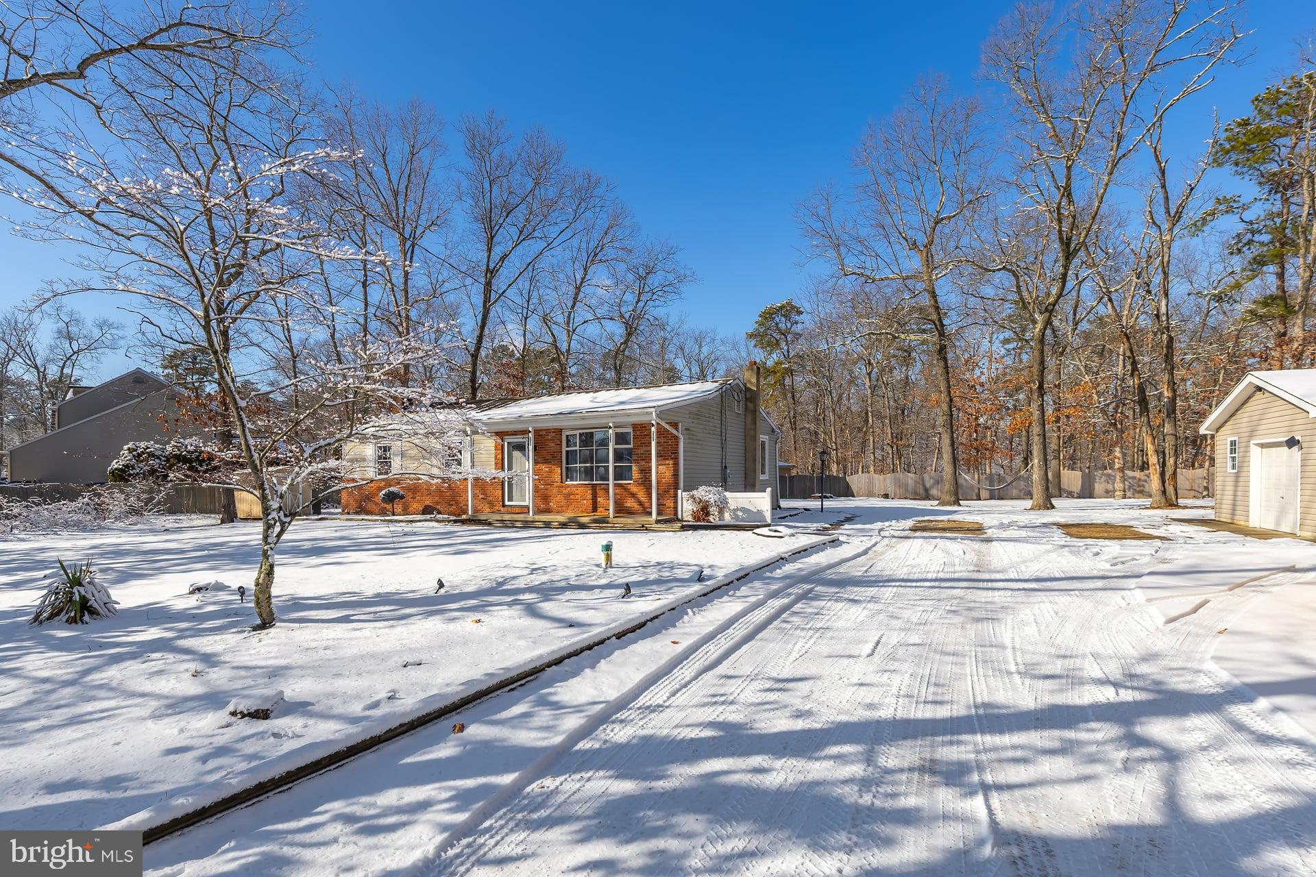 2311 Gennessee Avenue Atco, NJ 08004 - Photo 3 of 22 a view of a yard with trees