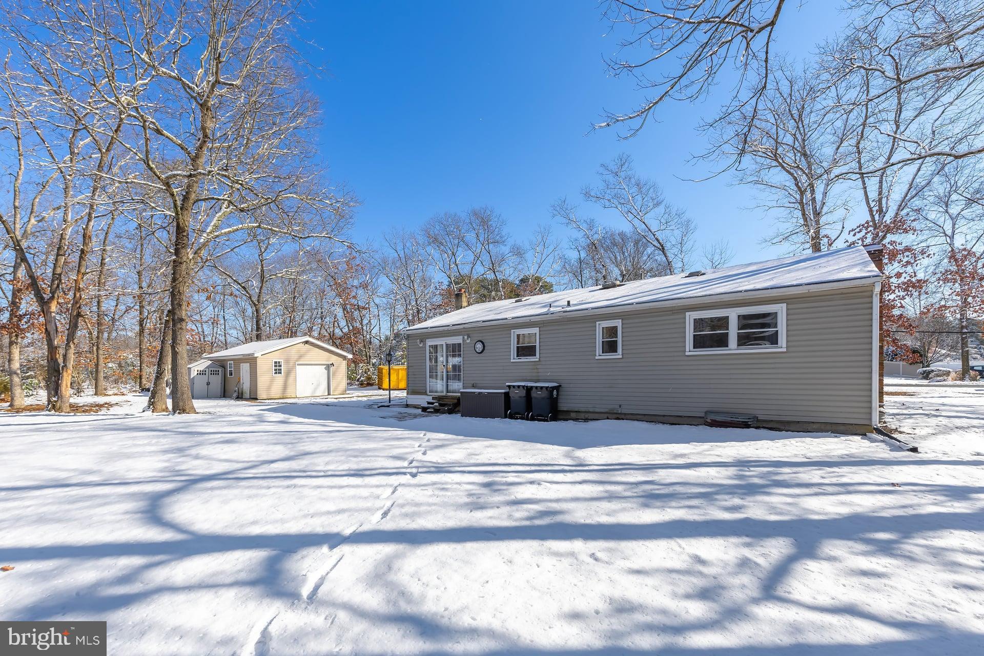 2311 Gennessee Avenue Atco, NJ 08004 - Photo 4 of 22 a view of a house with snow on the road