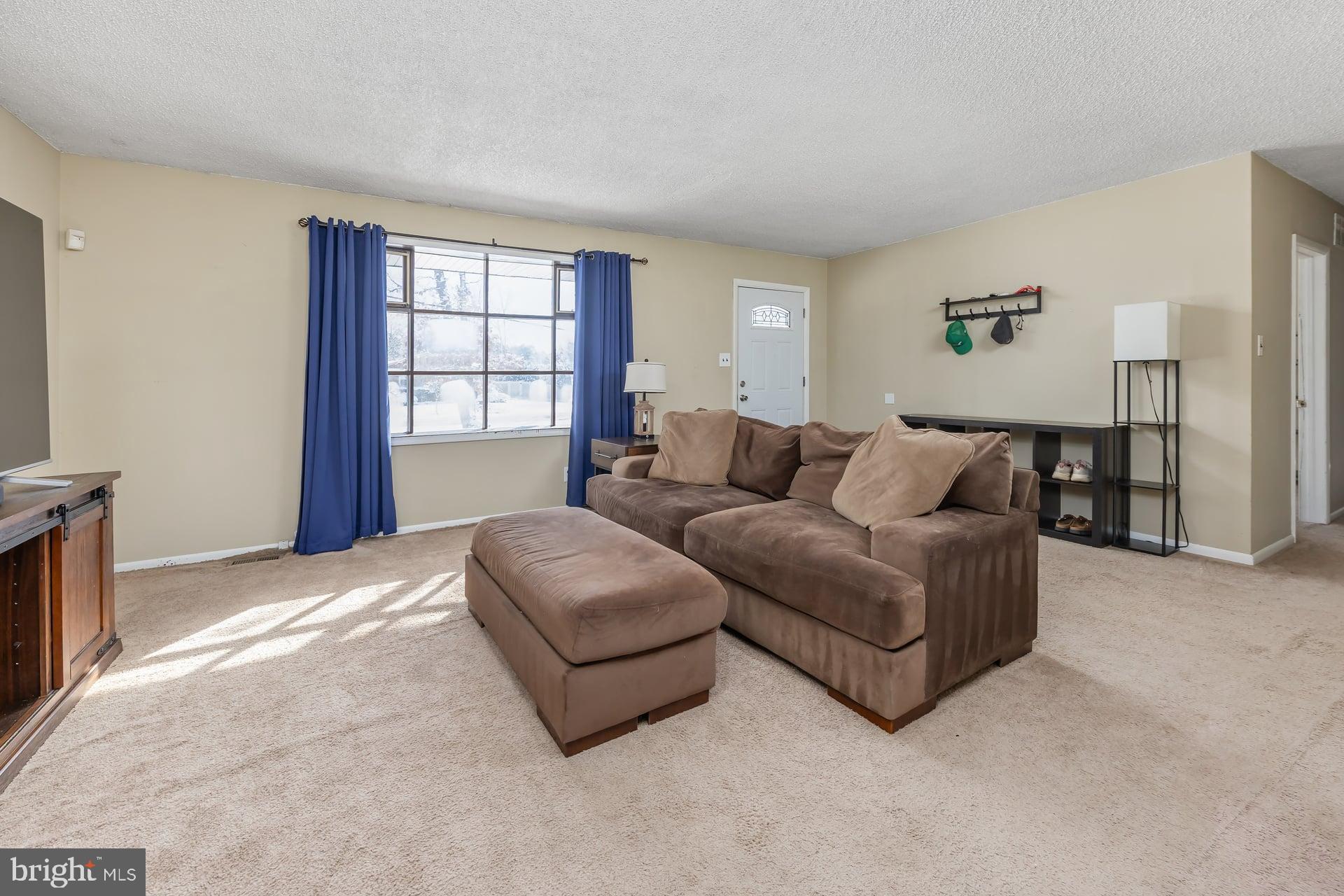 2311 Gennessee Avenue Atco, NJ 08004 - Photo 9 of 22 a living room with furniture and a window