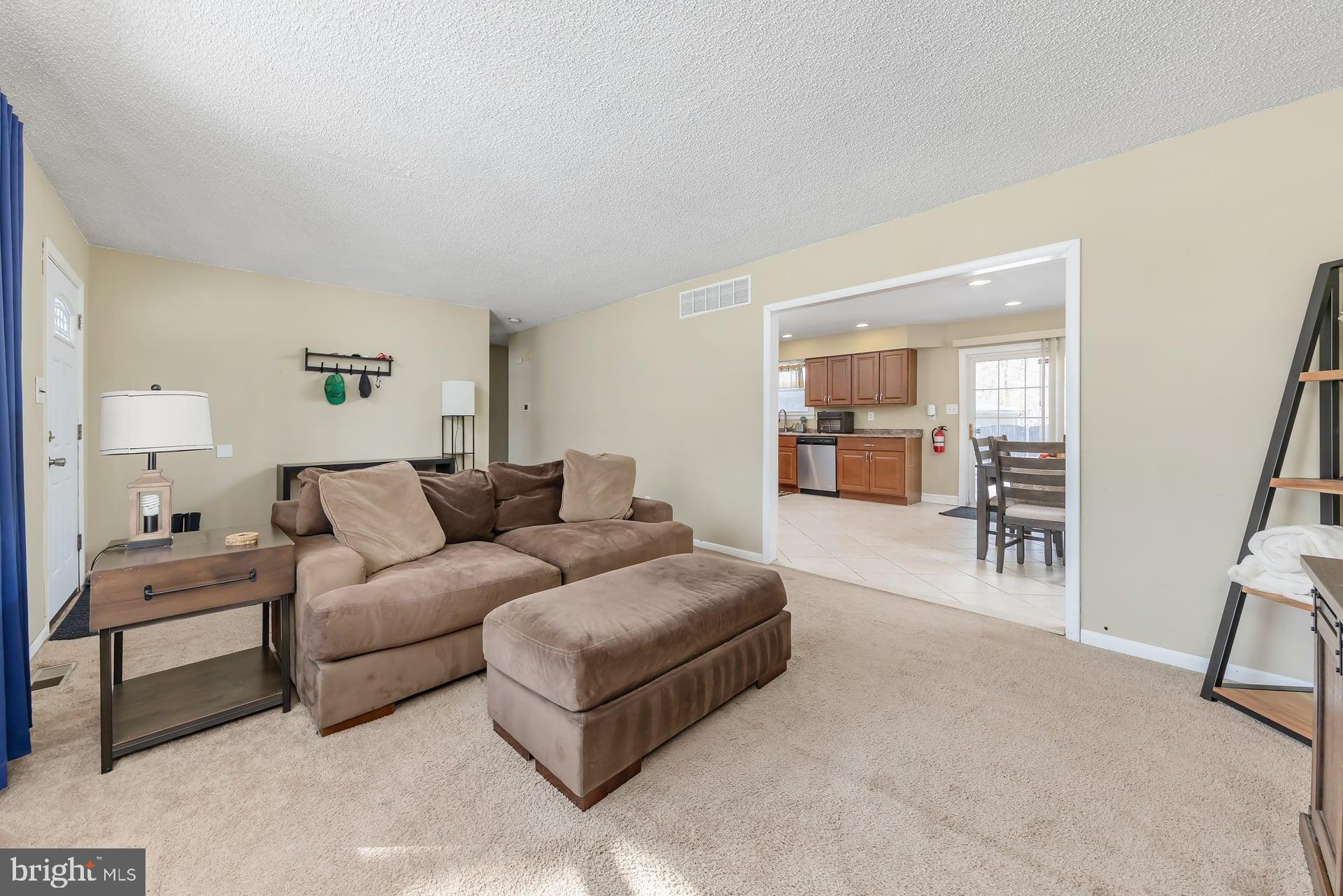 2311 Gennessee Avenue Atco, NJ 08004 - Photo 10 of 22 a living room with furniture and a wooden floor