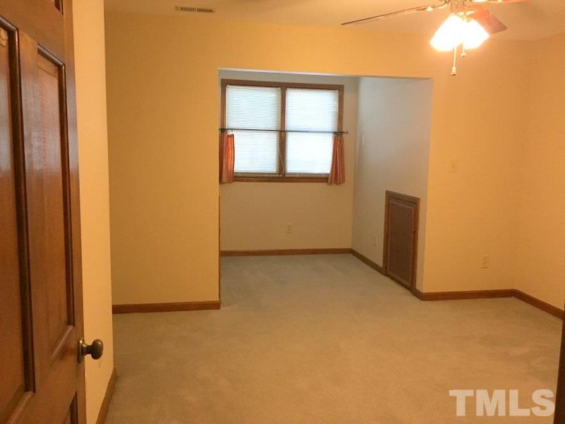 6239 Fountainhead Drive Raleigh, NC 27609 - Photo 11 of 17 a view of an empty room