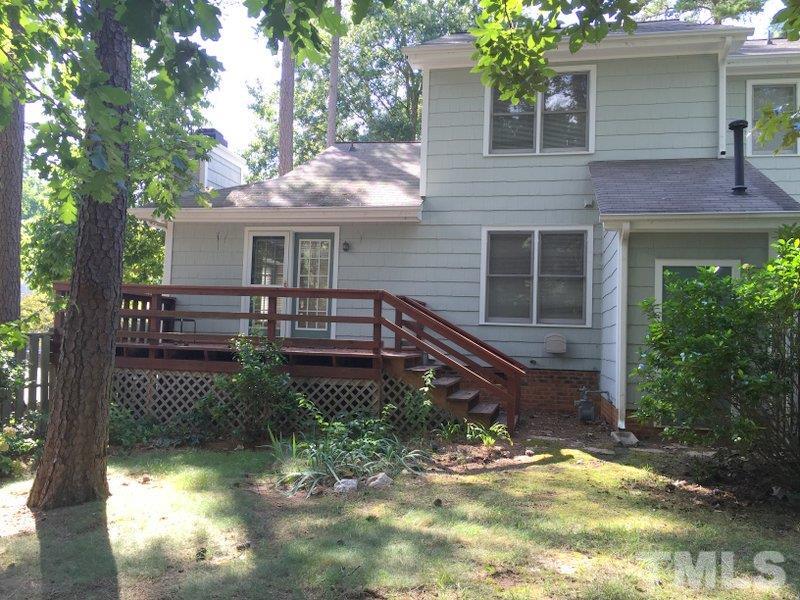 6239 Fountainhead Drive Raleigh, NC 27609 - Photo 13 of 17 a view of a house with backyard and sitting area