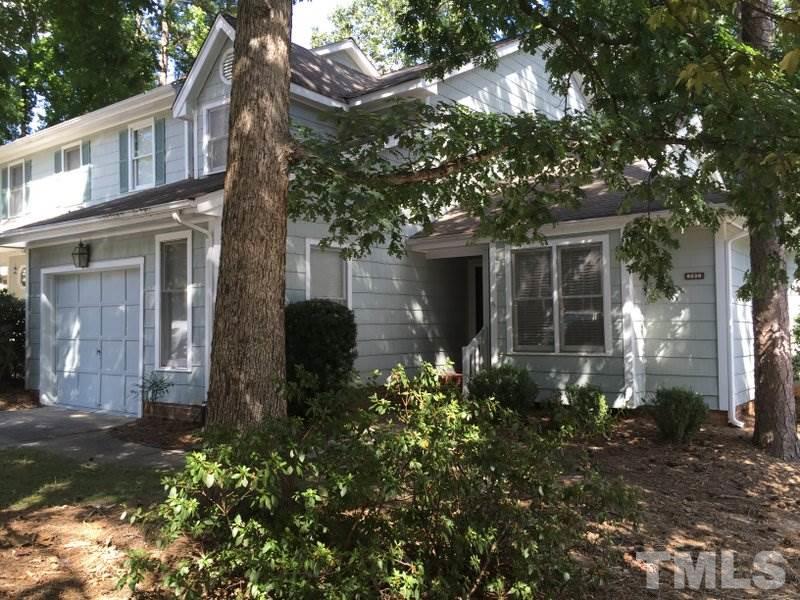6239 Fountainhead Drive Raleigh, NC 27609 - Photo 17 of 17 a front view of a house with garden