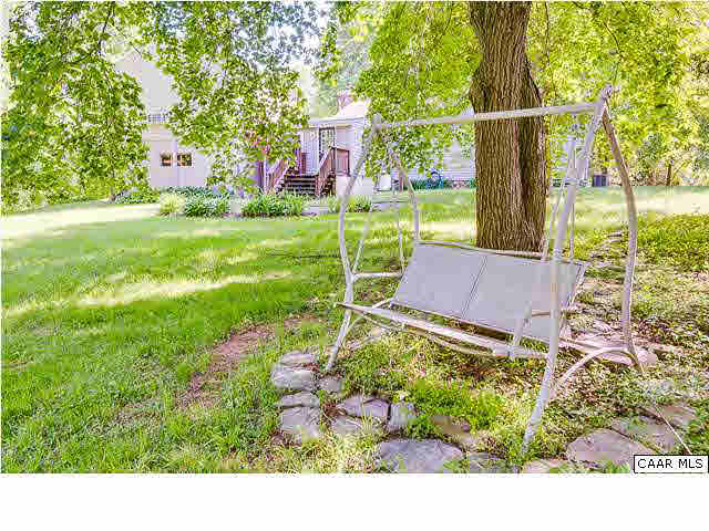 52 Carnation Road Ruckersville, VA 22968 - Photo 24 of 24 a backyard of a house with a yard and outdoor seating