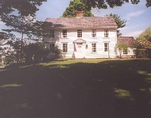 990 Hulls Farm Road Fairfield, CT 06890 - Photo 1 of 1 a large building with a street