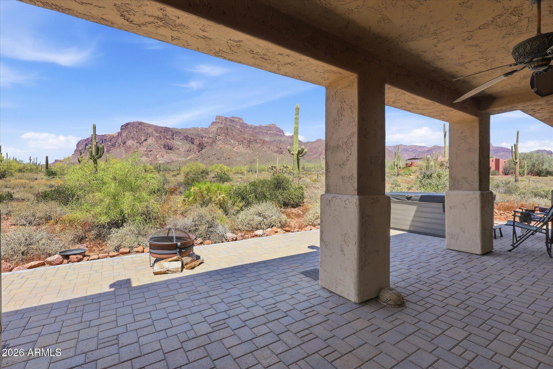 53 North La Barge Road Apache Junction, AZ 85119 - Photo 11 of 40 a view of a floor to ceiling window and a yard
