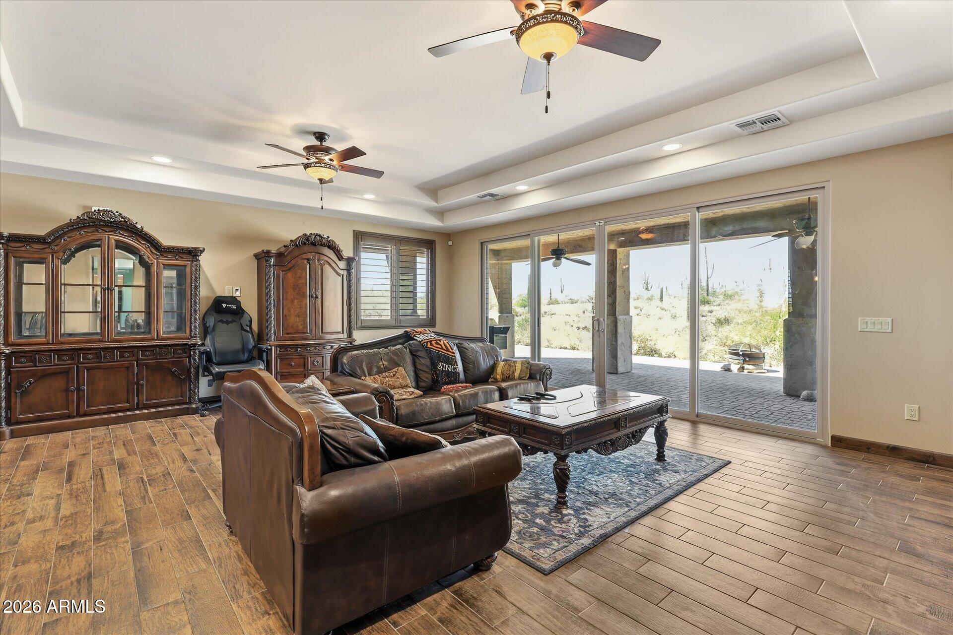 53 North La Barge Road Apache Junction, AZ 85119 - Photo 33 of 40 a living room with furniture and wooden floor