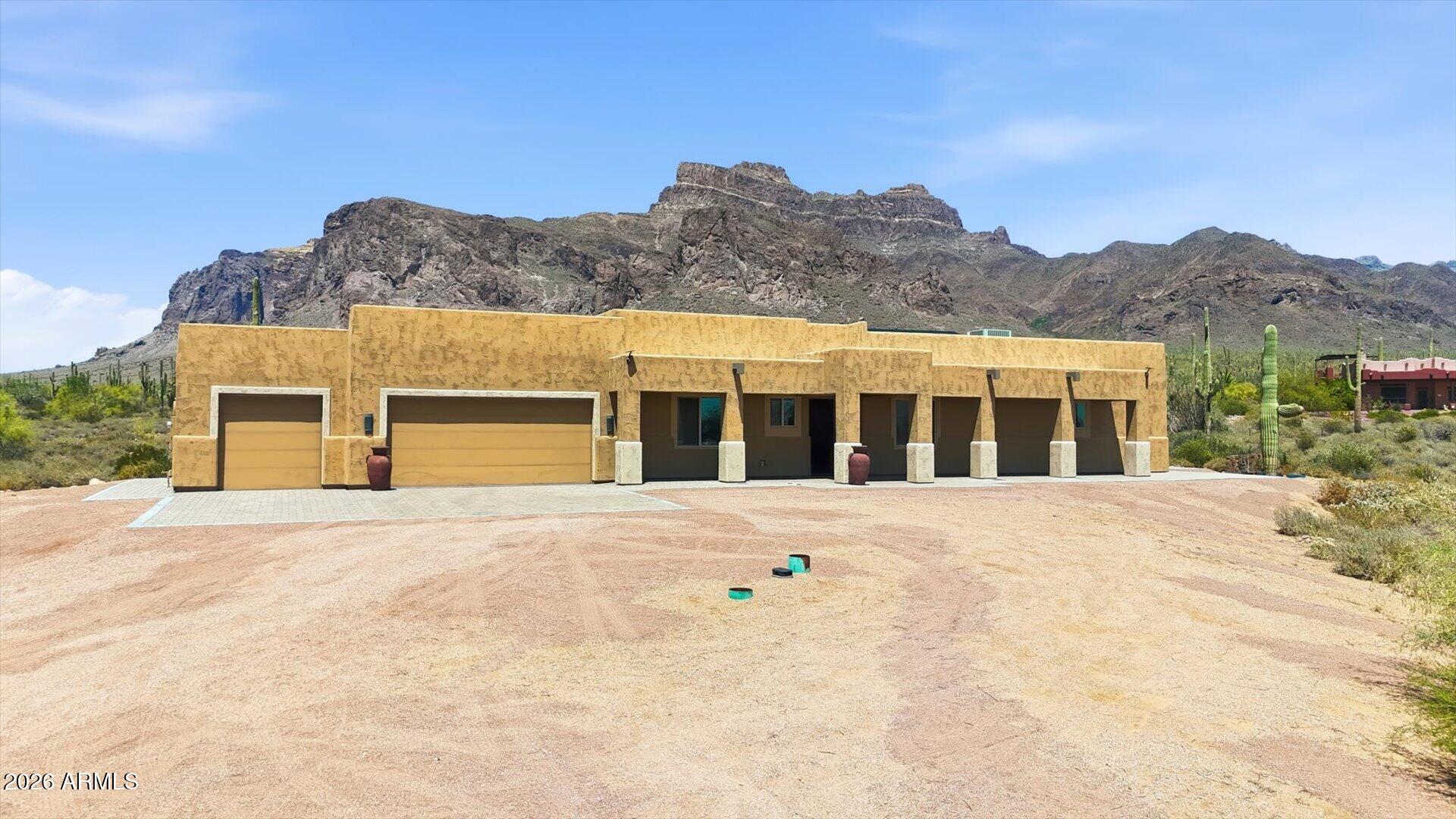 53 North La Barge Road Apache Junction, AZ 85119 - Photo 7 of 40 a front view of a house with a yard