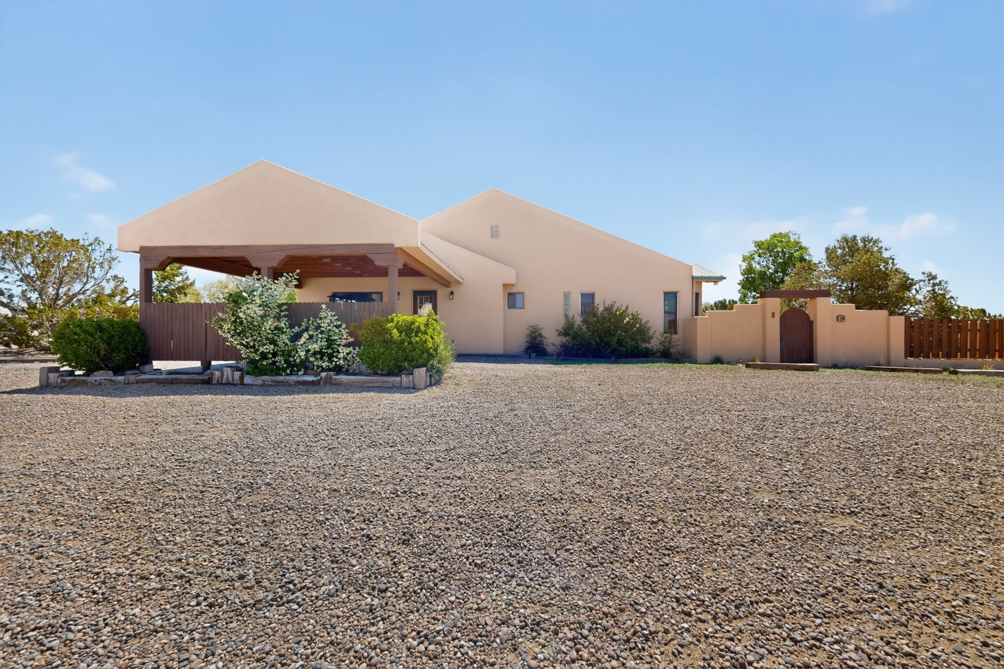10 Blue Mesa Road Santa Fe, NM 87508 - Photo 14 of 63 One of 2 carports. This one accesses the den/studio.