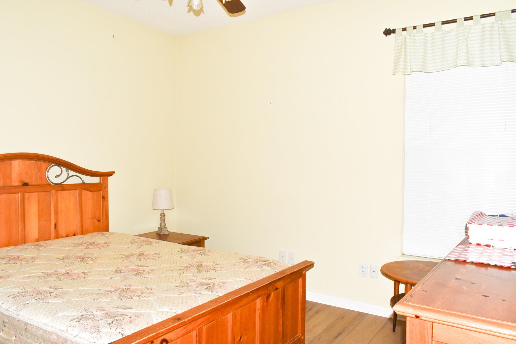 1670 Sedgefield Drive Murrells Inlet, SC 29576 - Photo 2 of 14 Bedroom with light wood-type flooring and ceiling fan