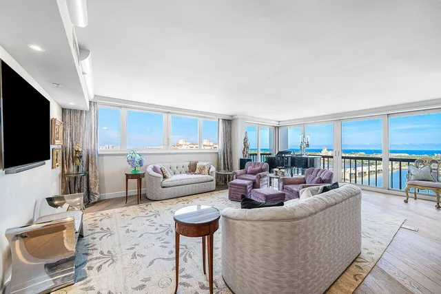 a balcony with furniture and a window