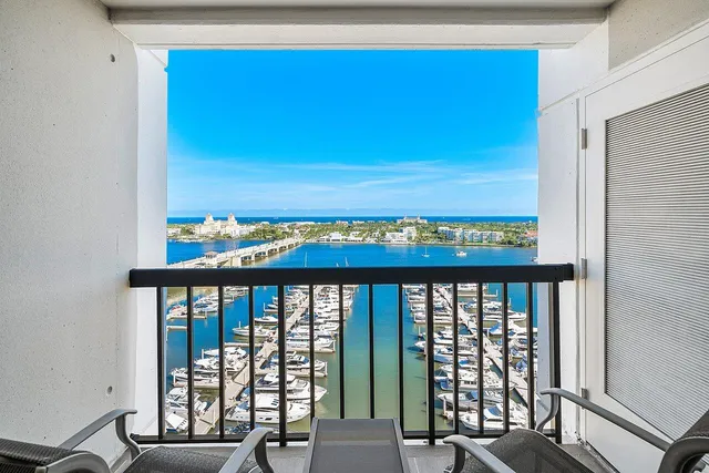 a bedroom with a bed and a television