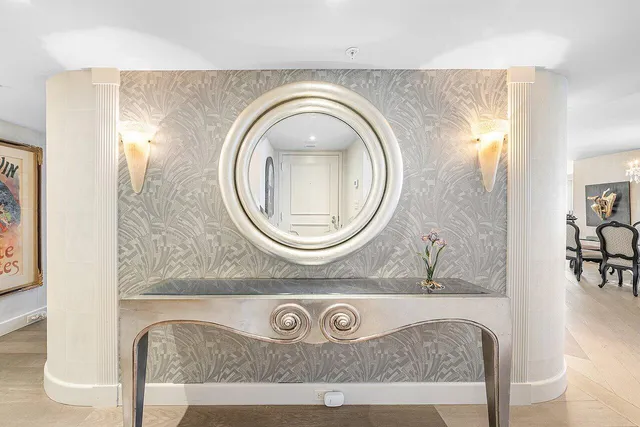 a view of a livingroom with car parked