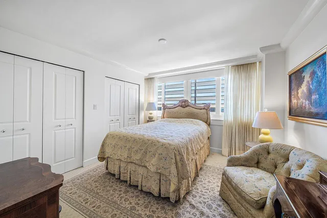 a view of a terrace with a garden and outdoor seating