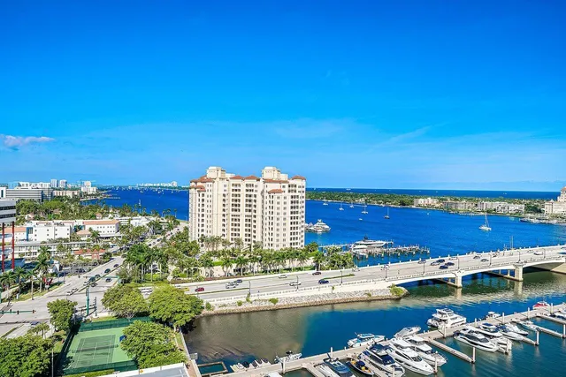 a view of a hallway with entryway door