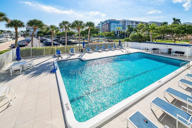 an aerial view of residential building and lake