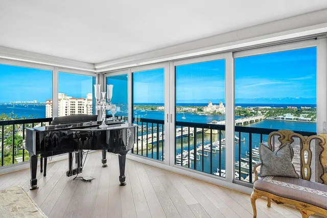a dining room with furniture and entryway
