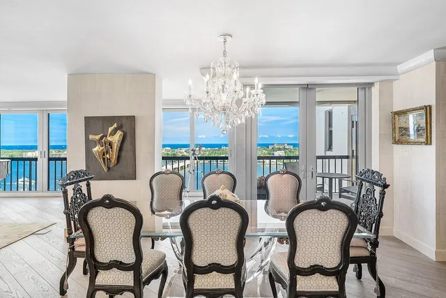 a living room with lots of furniture and wooden floor