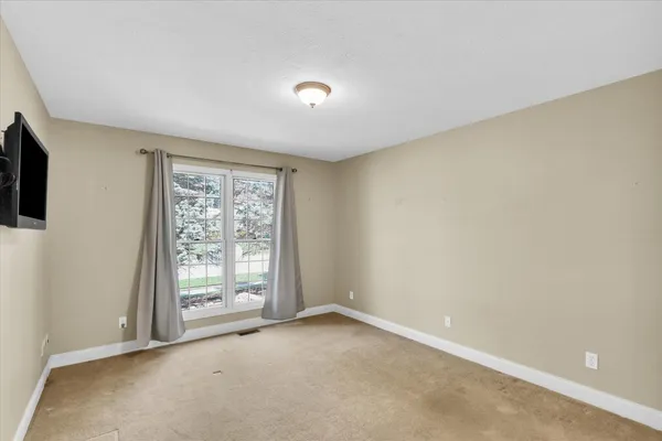 an empty room with windows