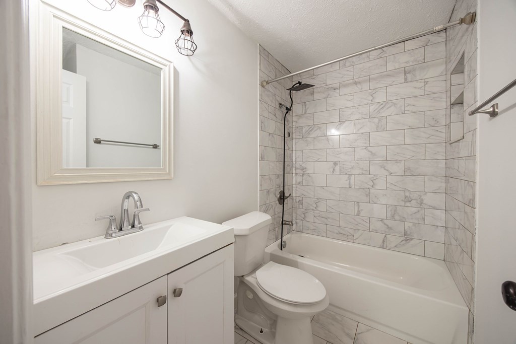 246 Sunnyside Church Road Pine Mountain, GA 31822 - Photo 13 of 26 a bathroom with a sink toilet and shower