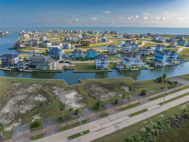 an aerial view of a residential building with outdoor space