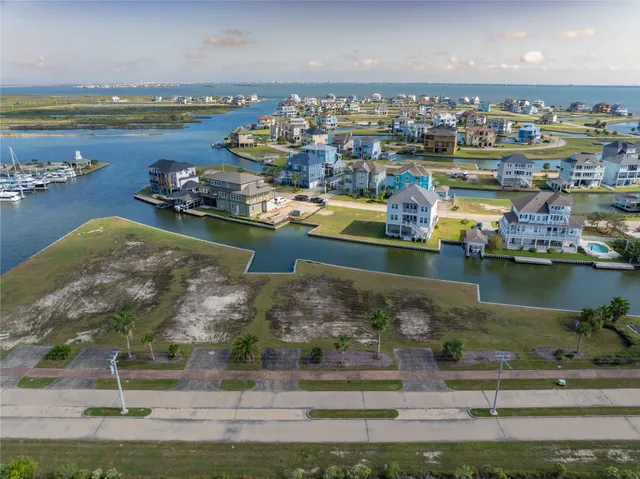 an aerial view of a houses with outdoor space