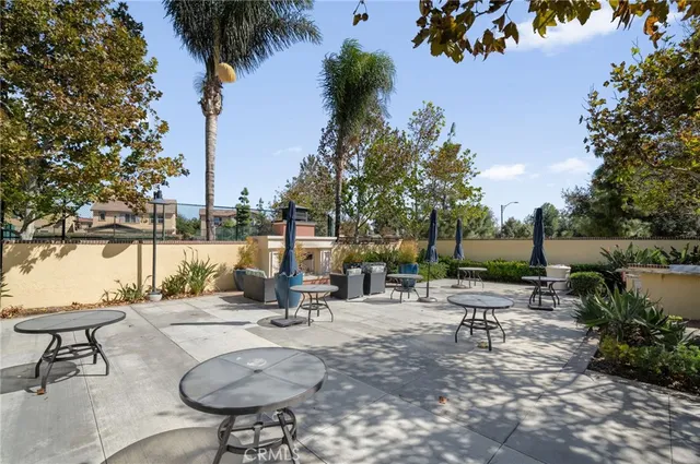 a view of a lake with outdoor seating