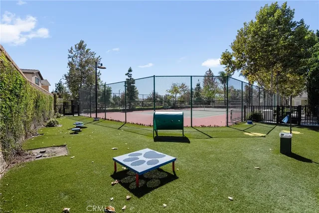a view of a wooden deck and a garden