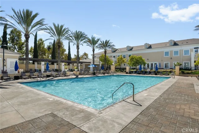 a view of a yard with palm trees