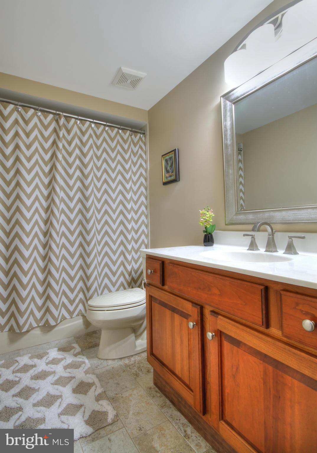 1207 Tottenham Court Reston, VA 20194 - Photo 24 of 30 Lower level travertine full bath