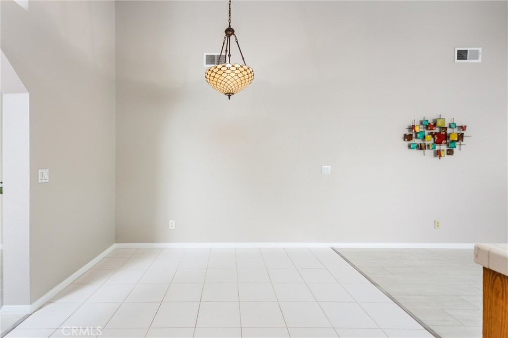 680 Indian Wells Road Banning, CA 92220 - Photo 8 of 37 a view of an empty room with a window