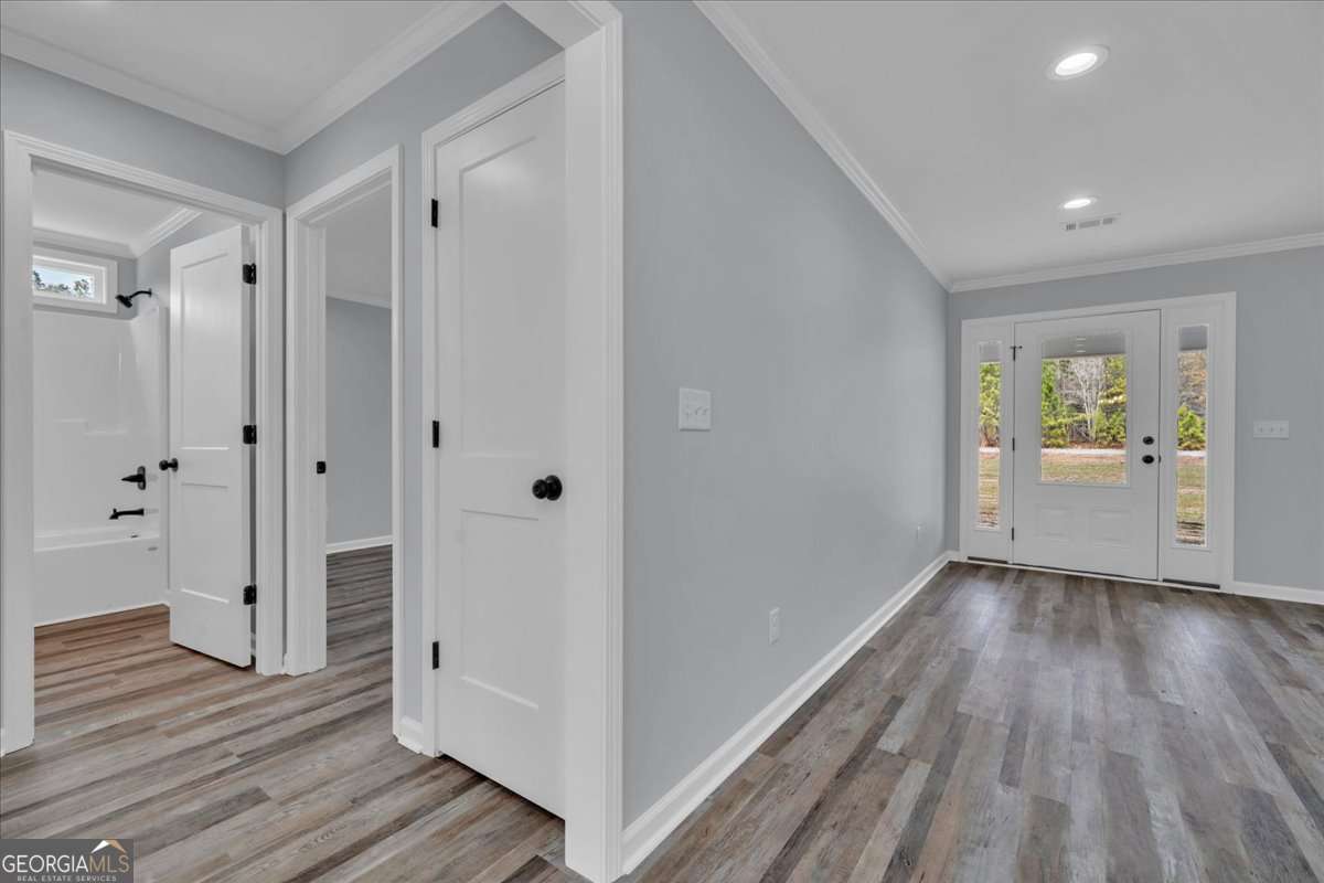 183 Bluegill Road Vienna, GA 31092 - Photo 30 of 67 a view of an empty room and wooden floor