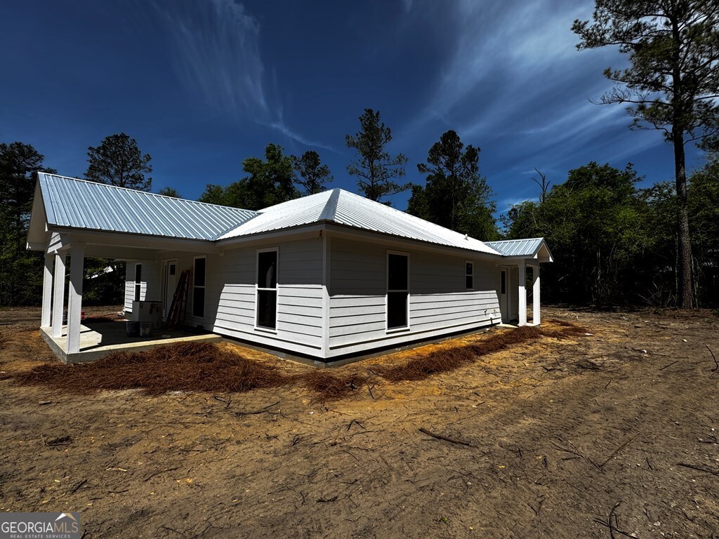 183 Bluegill Road Vienna, GA 31092 - Photo 61 of 67 a front view of a house with a yard