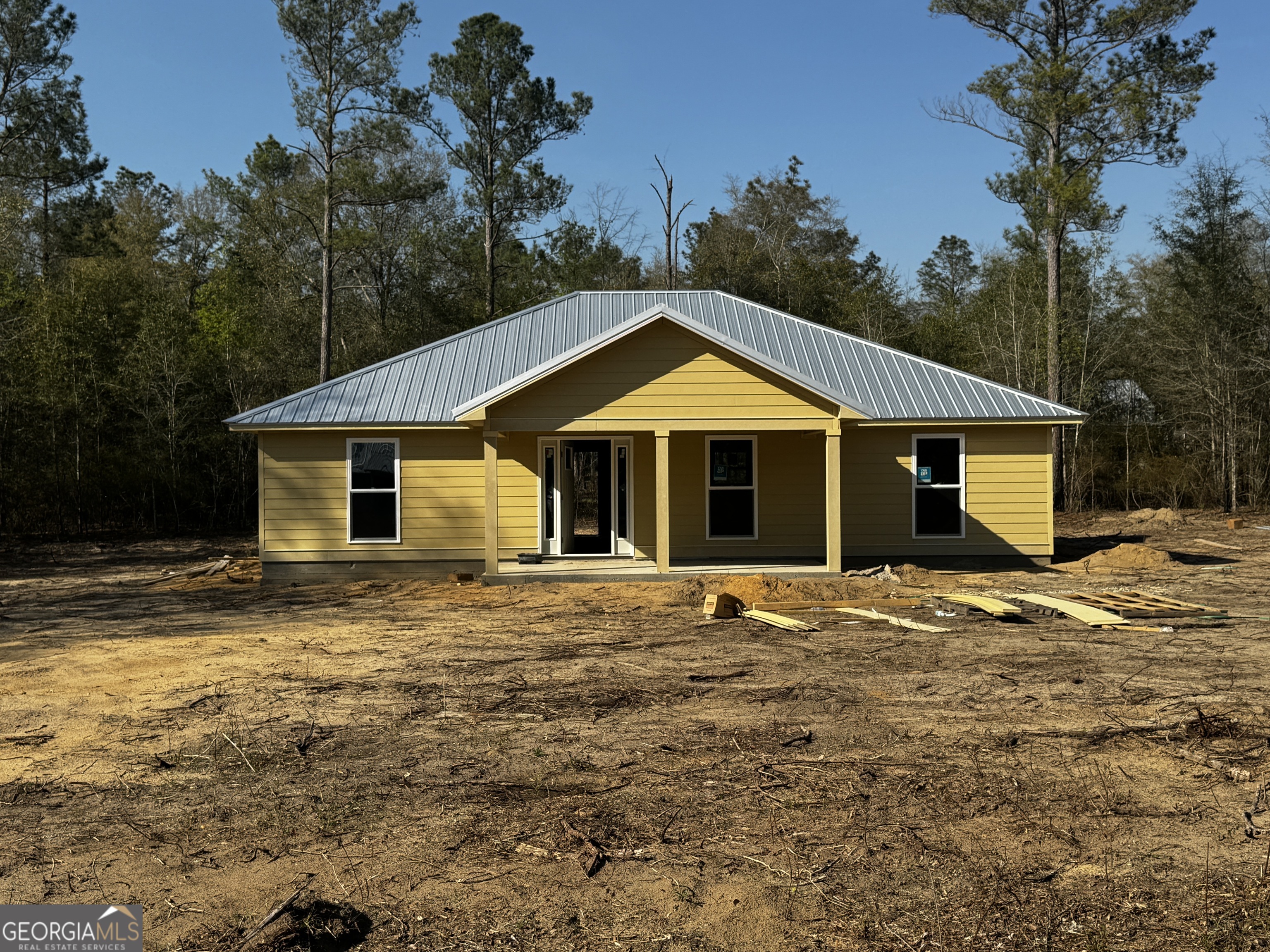 183 Bluegill Road Vienna, GA 31092 - Photo 7 of 67 a front view of a house with a garden