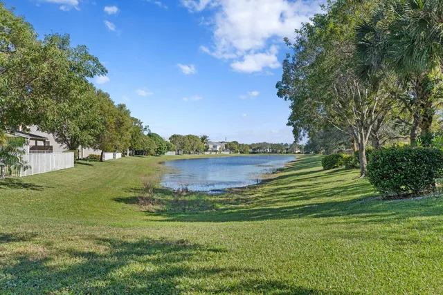 a view of a lake with a big yard