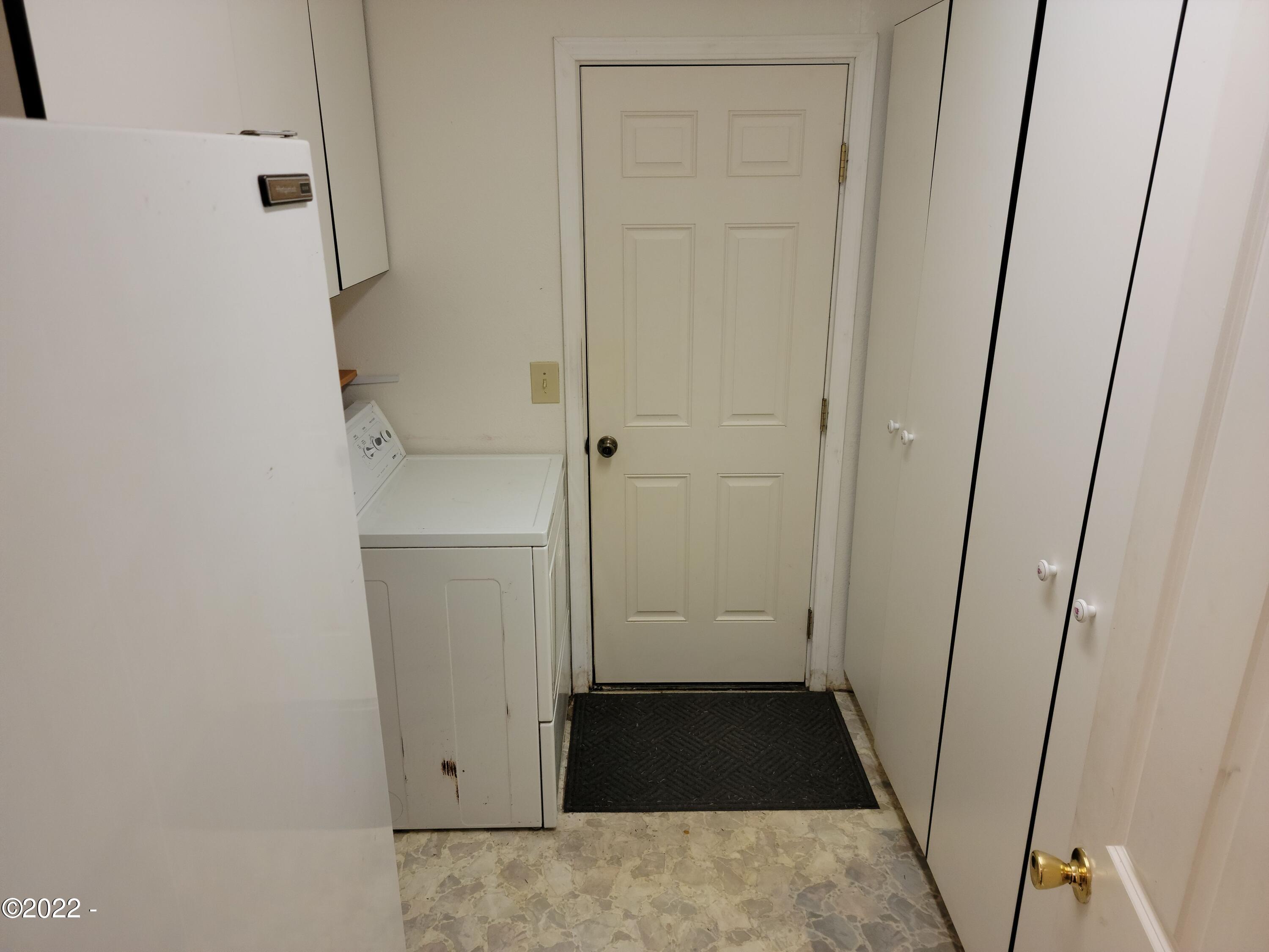 720 Collins Street Depoe Bay, OR 97341 - Photo 9 of 23 Utility Room
