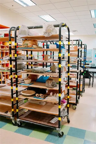 a view of an outdoor space with furniture and garden