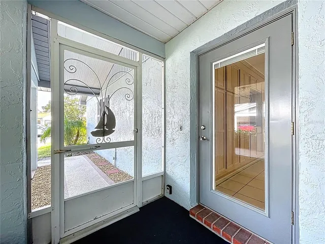 a kitchen with stainless steel appliances a sink and cabinets