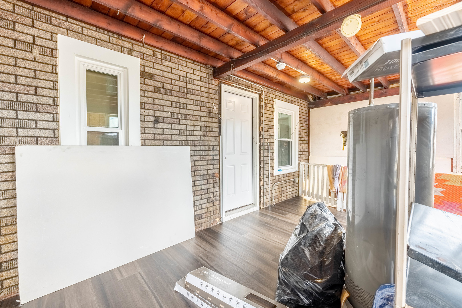 2027 West 18th Place, Unit 2 Chicago, IL 60608 - Photo 20 of 21 a bed room with furniture and a window