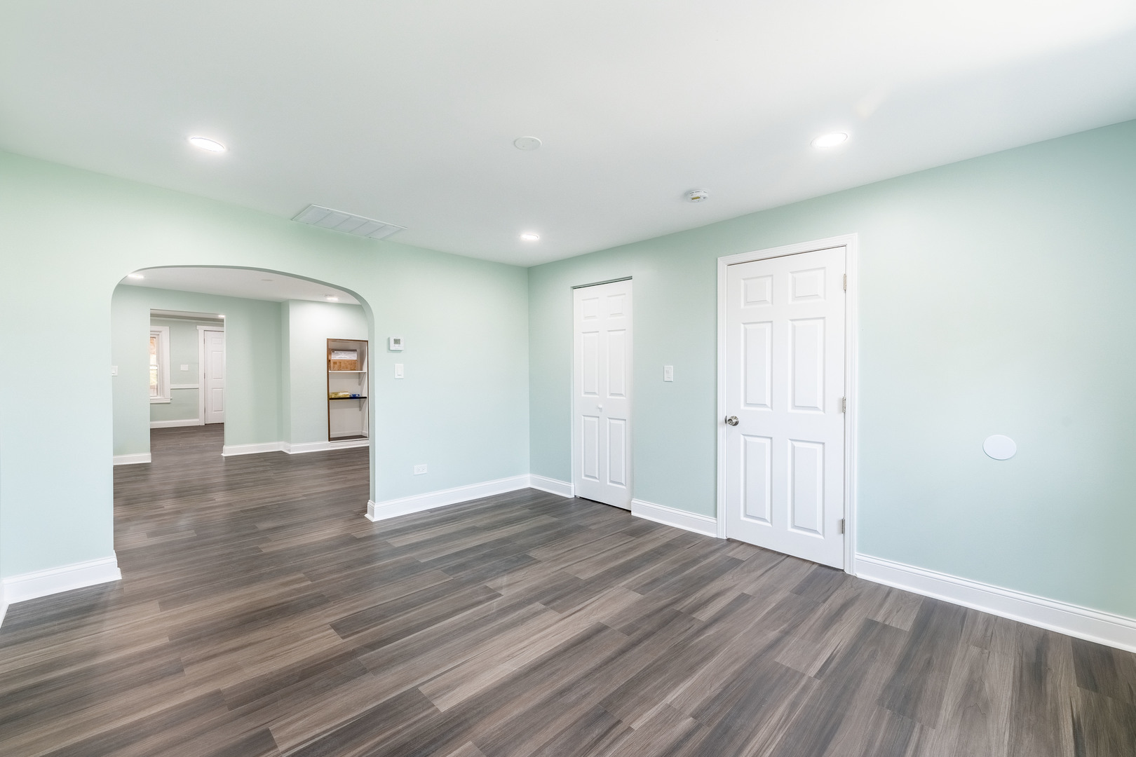 2027 West 18th Place, Unit 2 Chicago, IL 60608 - Photo 10 of 21 a view of empty room with wooden floor