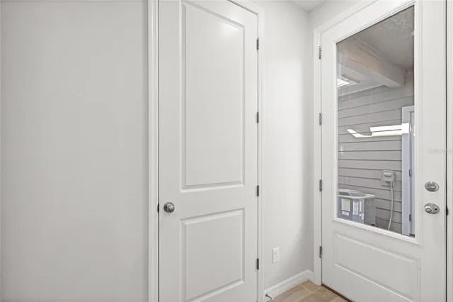 a view of a bathroom from a empty room