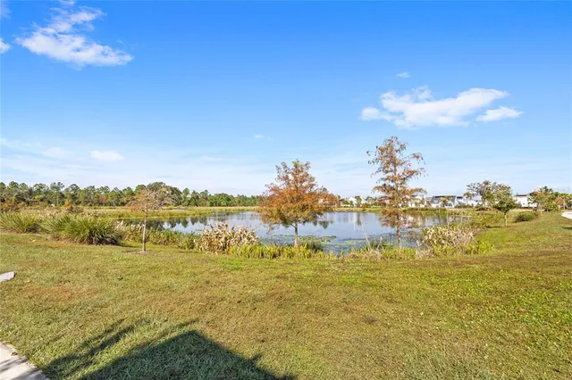 a view of an ocean with boats
